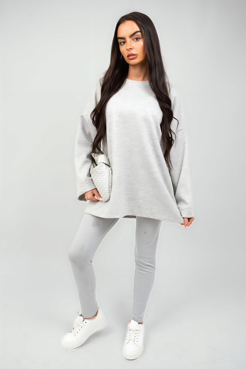 Light grey oversized crewneck sweatshirt with long sleeves, front view