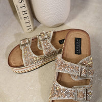 Sparkly double-buckle platform sandals with stone-studded cross straps