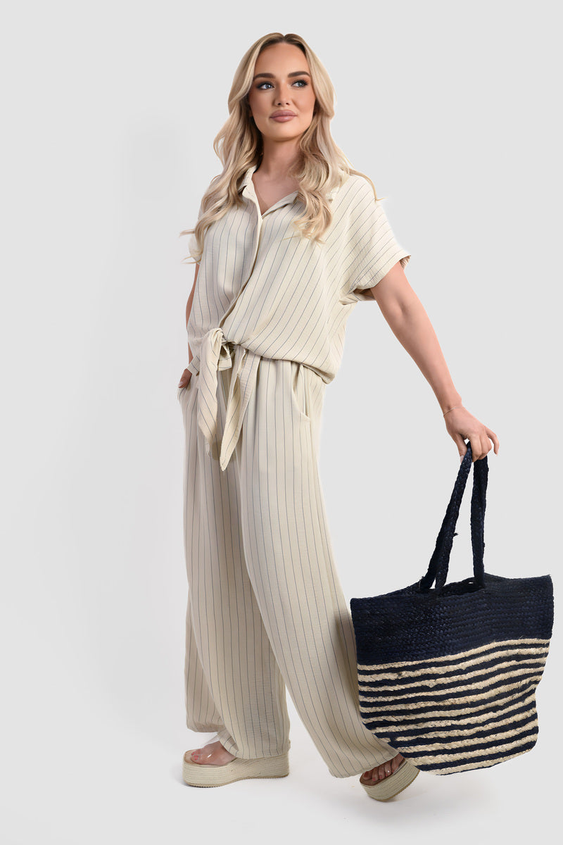 Striped co-ord set in light beige: short-sleeve tied waist top with wide-leg trousers