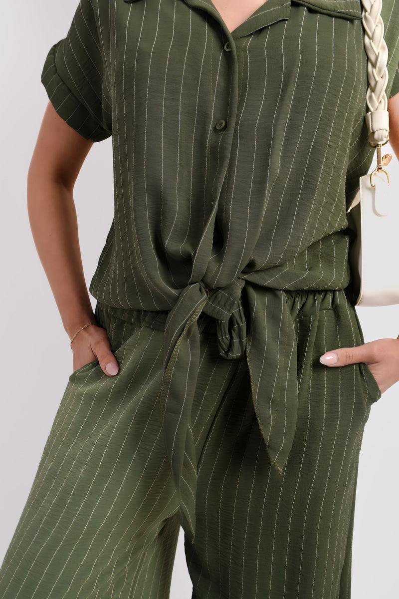 Dark green striped short-sleeve shirt with button front and tied waist over matching trousers
