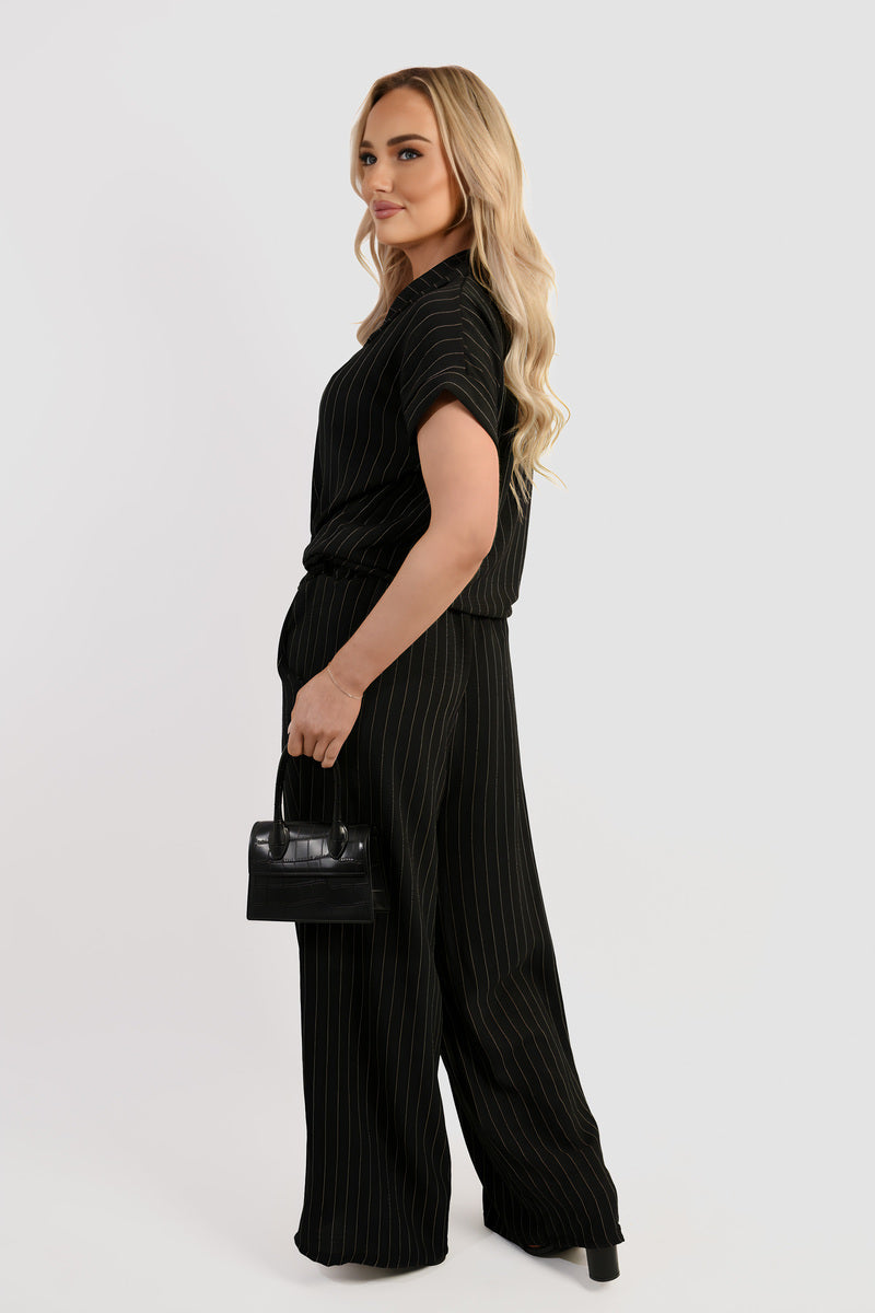 Striped co-ord set in black: short-sleeve tie-front top with wide-leg trousers