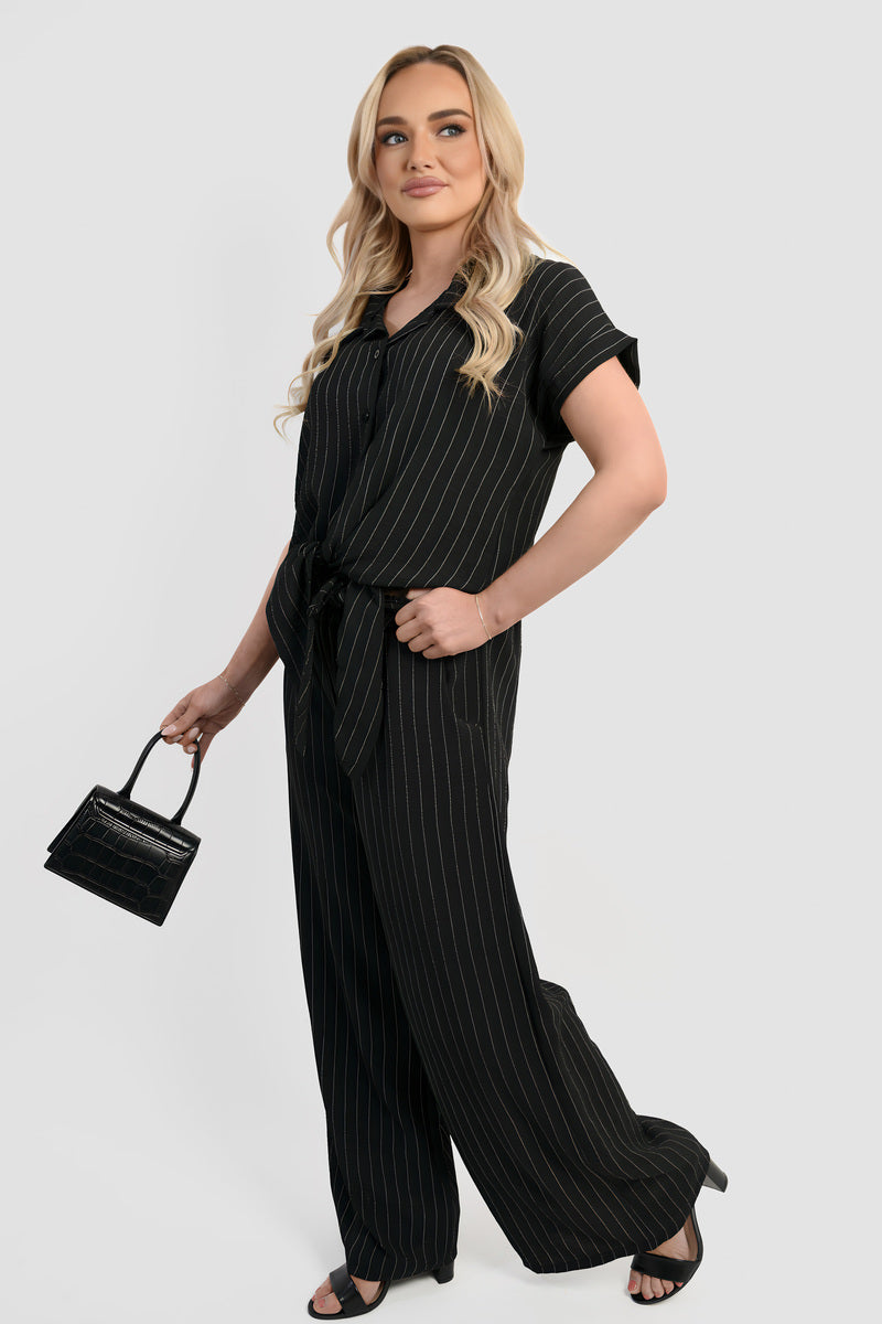 Black striped co-ord set with tie-front top, button placket, and wide-leg trousers
