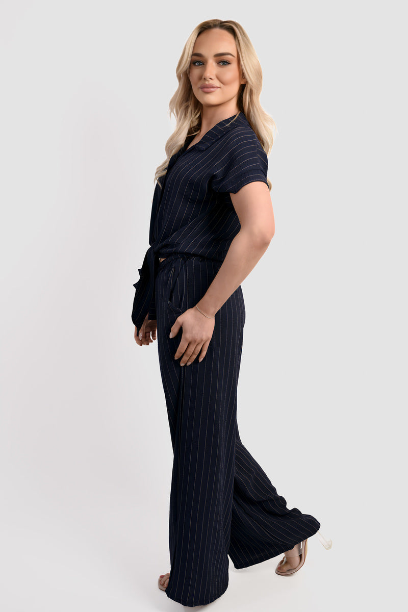 Navy pinstripe tie-front co-ord set with wide-leg trousers and side drape