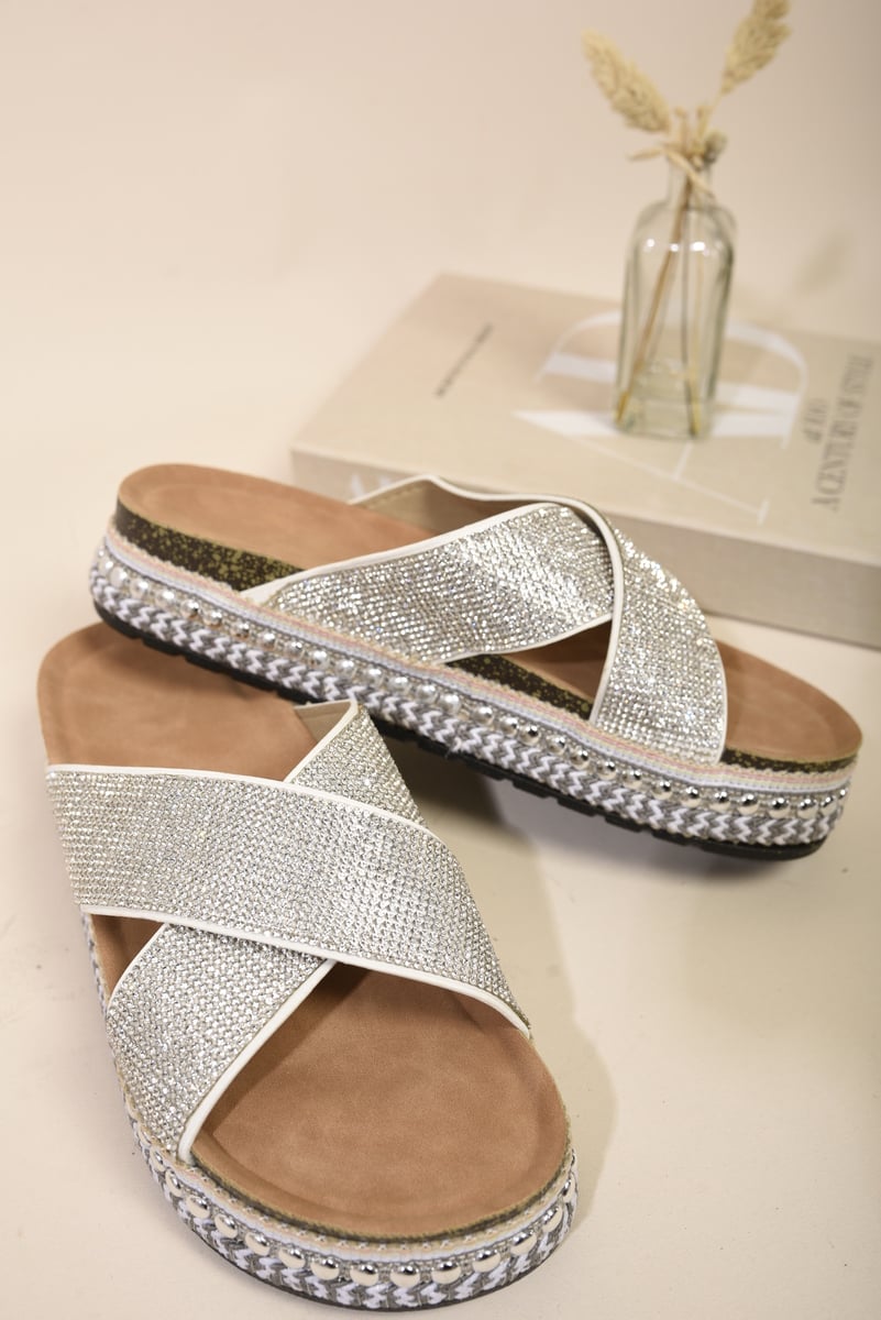 White diamante platform slide sandals with crisscross straps and braided trim sole