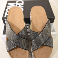 Pair of black diamante platform slide sandals with braided trim and crisscross straps