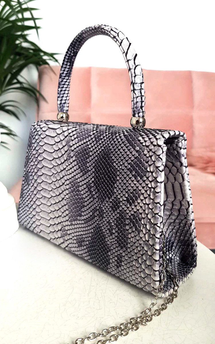 Faux Leather Handbag in Lilac with Top Handle and Chain Strap
