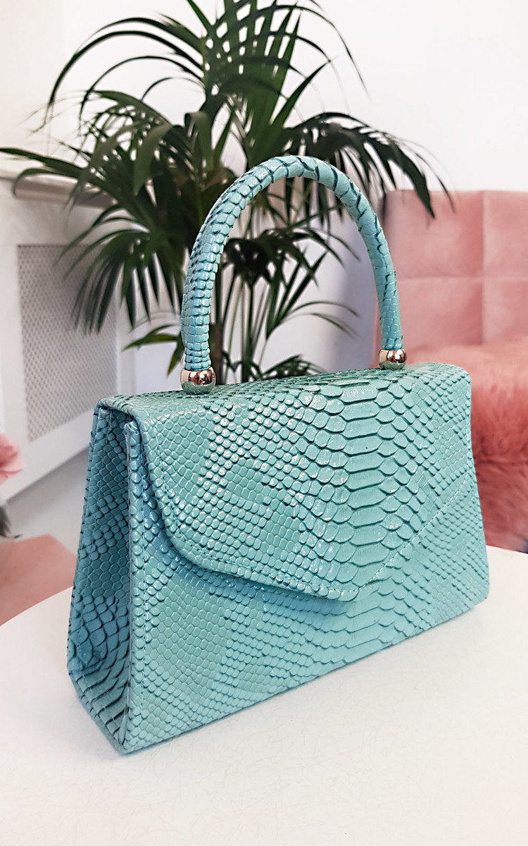 Faux Leather Handbag in Lilac with Top Handle and Chain Strap