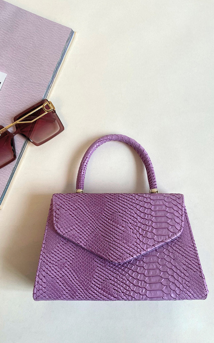 Faux Leather Handbag in Lilac with Top Handle and Chain Strap