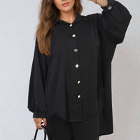 Black oversized collared button-down top, gold-tone buttons, long puff sleeves