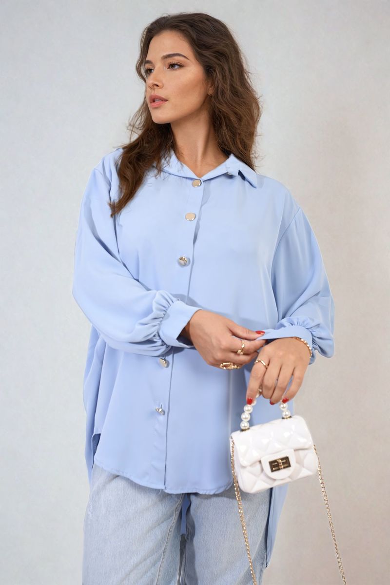 Light blue oversized collared button-down top, long sleeves, front button placket