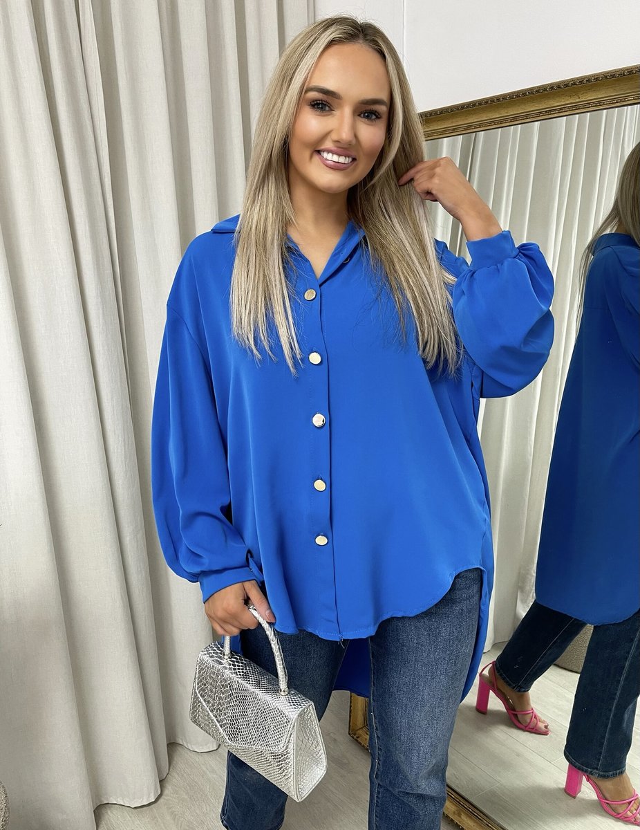 Royal blue oversized collared button-down top with long puff sleeves and front buttons