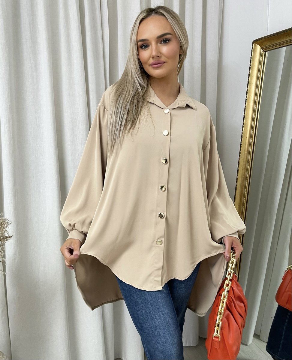 Oversized collared button-down shirt in beige with long puff sleeves and front buttons