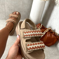 Khaki platform sandals with red-and-white crochet trim and double-buckle strap