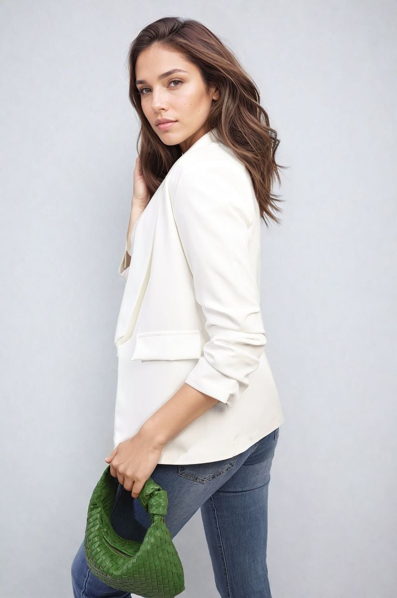 White open-front blazer jacket with ruched sleeves and front pockets, side profile