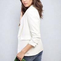 White open-front blazer jacket with ruched sleeves and front pockets, side profile