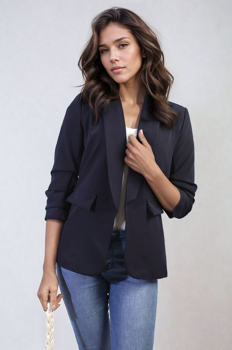 Dark navy open-front blazer jacket with ruched sleeves and front pockets, standing view