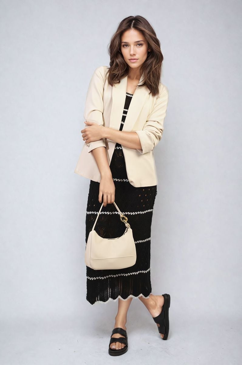 Light beige open front blazer with ruched sleeves and front pockets
