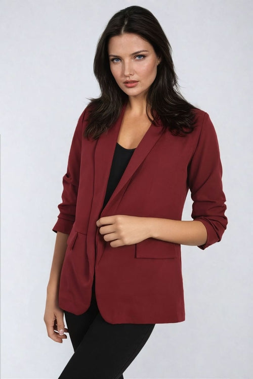Open-front ruched-sleeve blazer jacket in burgundy with front pockets and notch lapels.