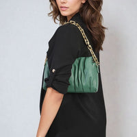 Black open-front cardigan with elbow-length sleeves and draped front, side pockets