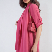 Fuchsia pink open-front cardigan with rolled sleeves and loose draped front