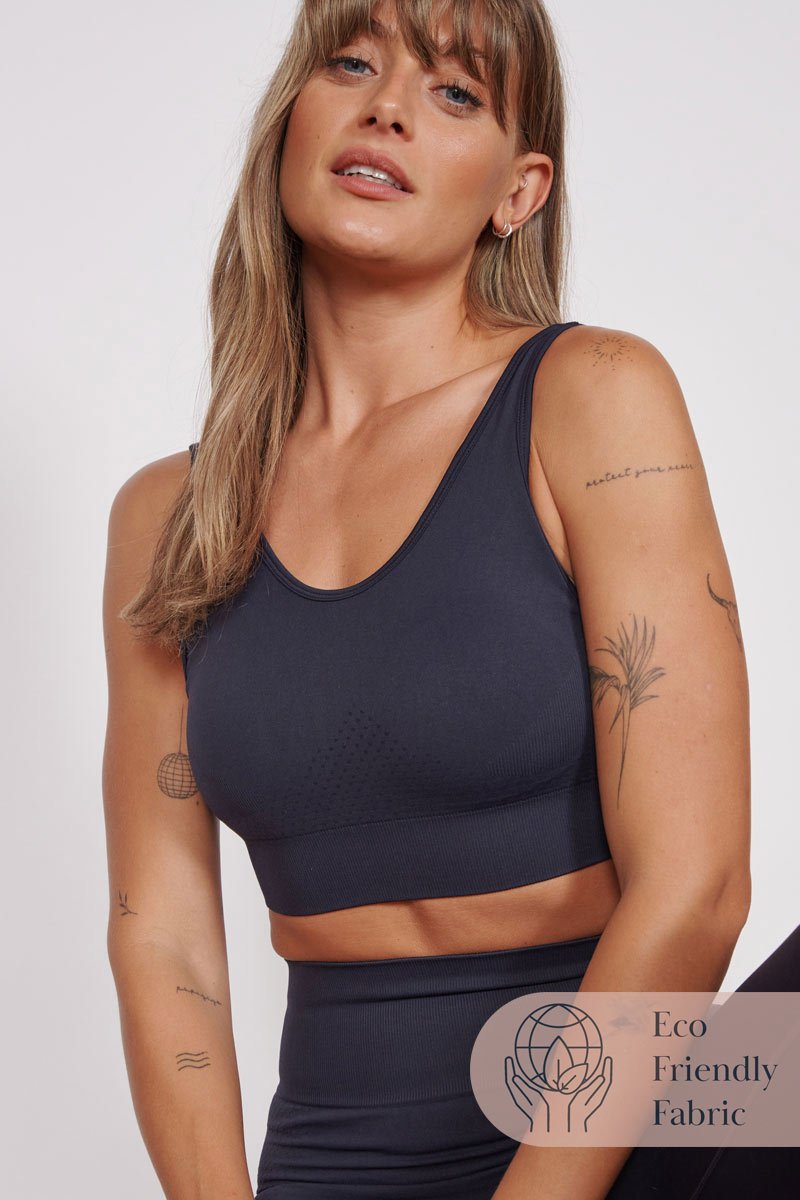 Petite seam-free sports bra in navy with racerback, sleeveless cropped fit