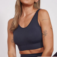 Petite seam-free sports bra in navy with racerback, sleeveless cropped fit
