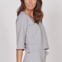 Grey marl lounge top back view with elbow-length sleeves and cropped boxy fit
