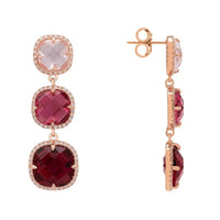 Rose gold tiered drop earrings with faceted pink and burgundy stones, side view
