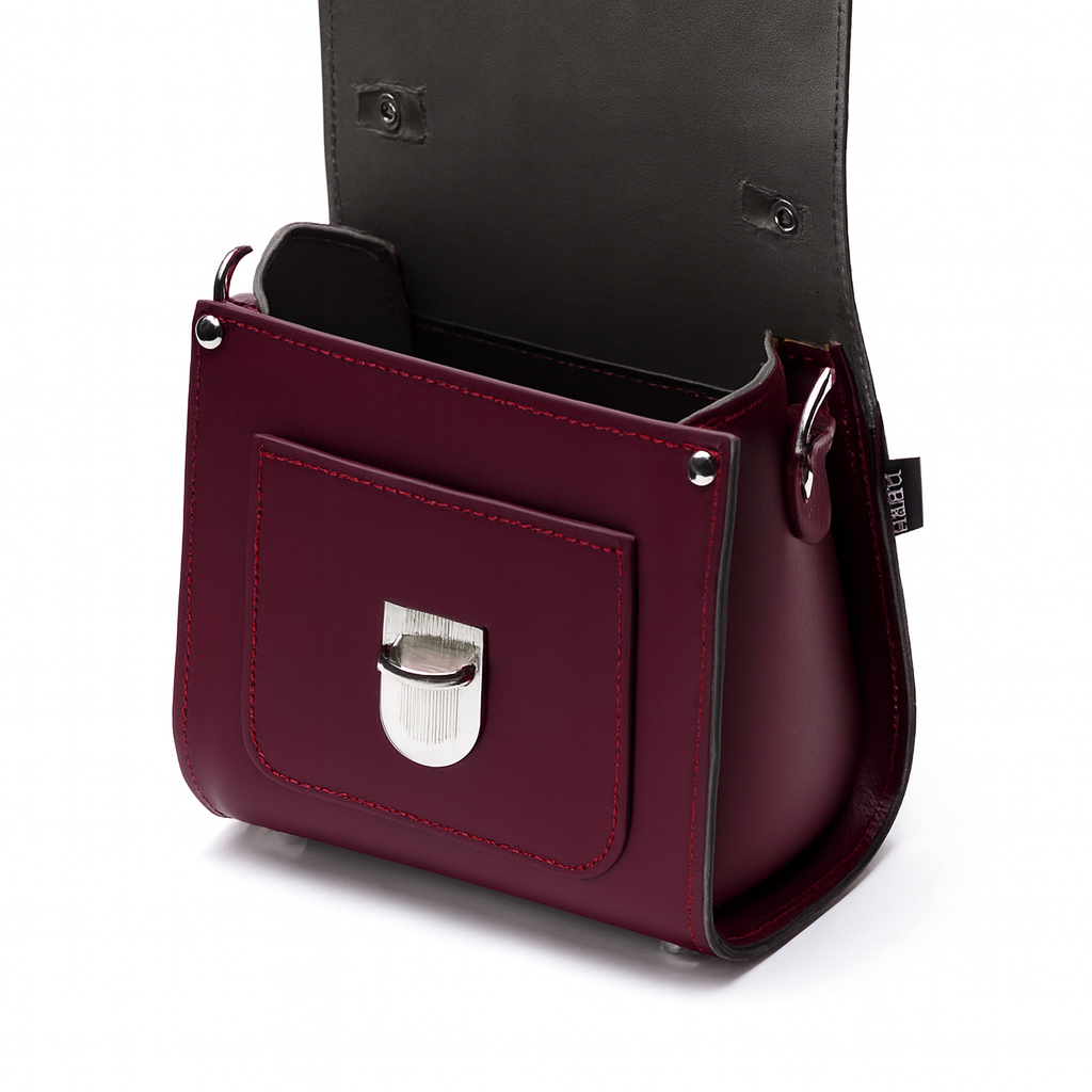 Marsala red leather crossbody with open front pocket and silver clasp