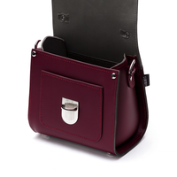 Marsala red leather crossbody with open front pocket and silver clasp