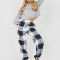 Navy and white checked joggers with elastic cuffs and drawstring waistband