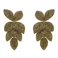 Petal cascading flower earrings with gold-tone petals and green stones