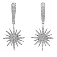 Silver starburst drop earrings with textured hoops and dangling sunburst charms