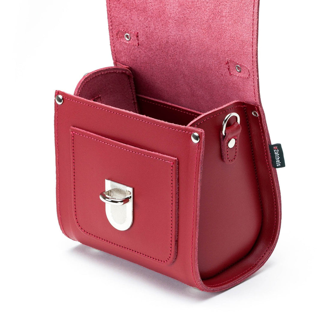 Red leather handbag interior with side pocket and silver clasp on front flap