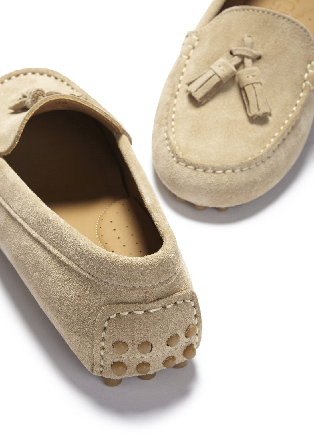 Suede loafer with perforated insole and rubber heel grips