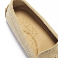 Suede loafer interior with HUGS® branded insole and perforated footbed