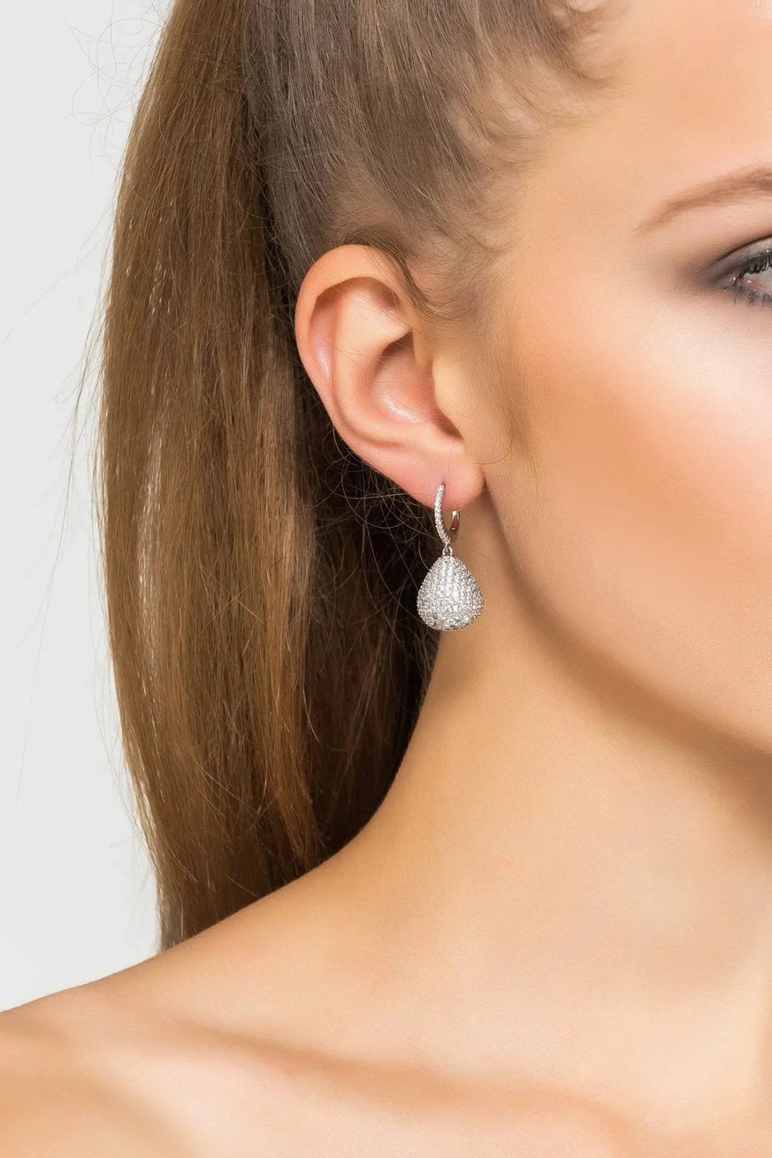 Pear drop gemstone earring with silver setting and white CZ