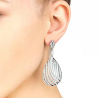 Silver teardrop earring with layered crystal drop design