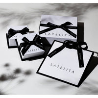 Gift boxes for ruby pendant necklace with black ribbon and LATELITA tags