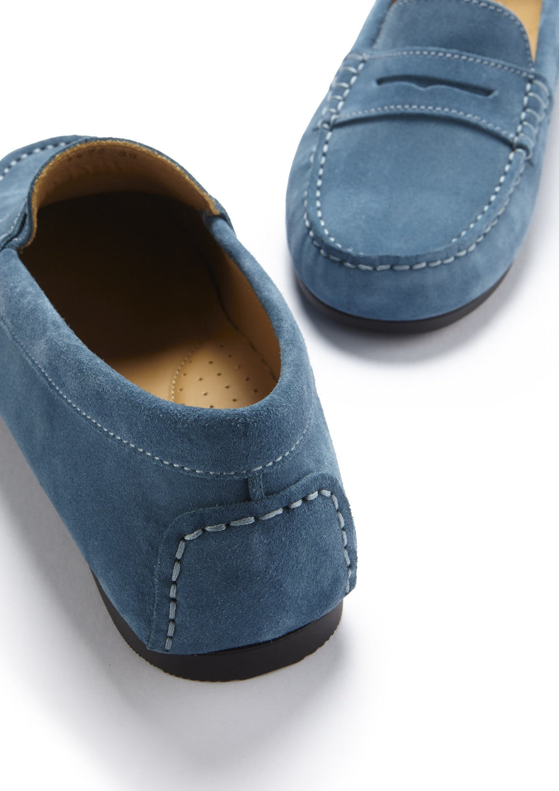Teal suede loafer heel with stitched seams and tan insole