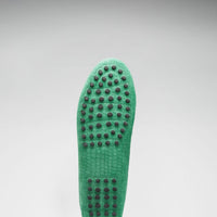 Emerald loafer sole with raised rubber grip studs