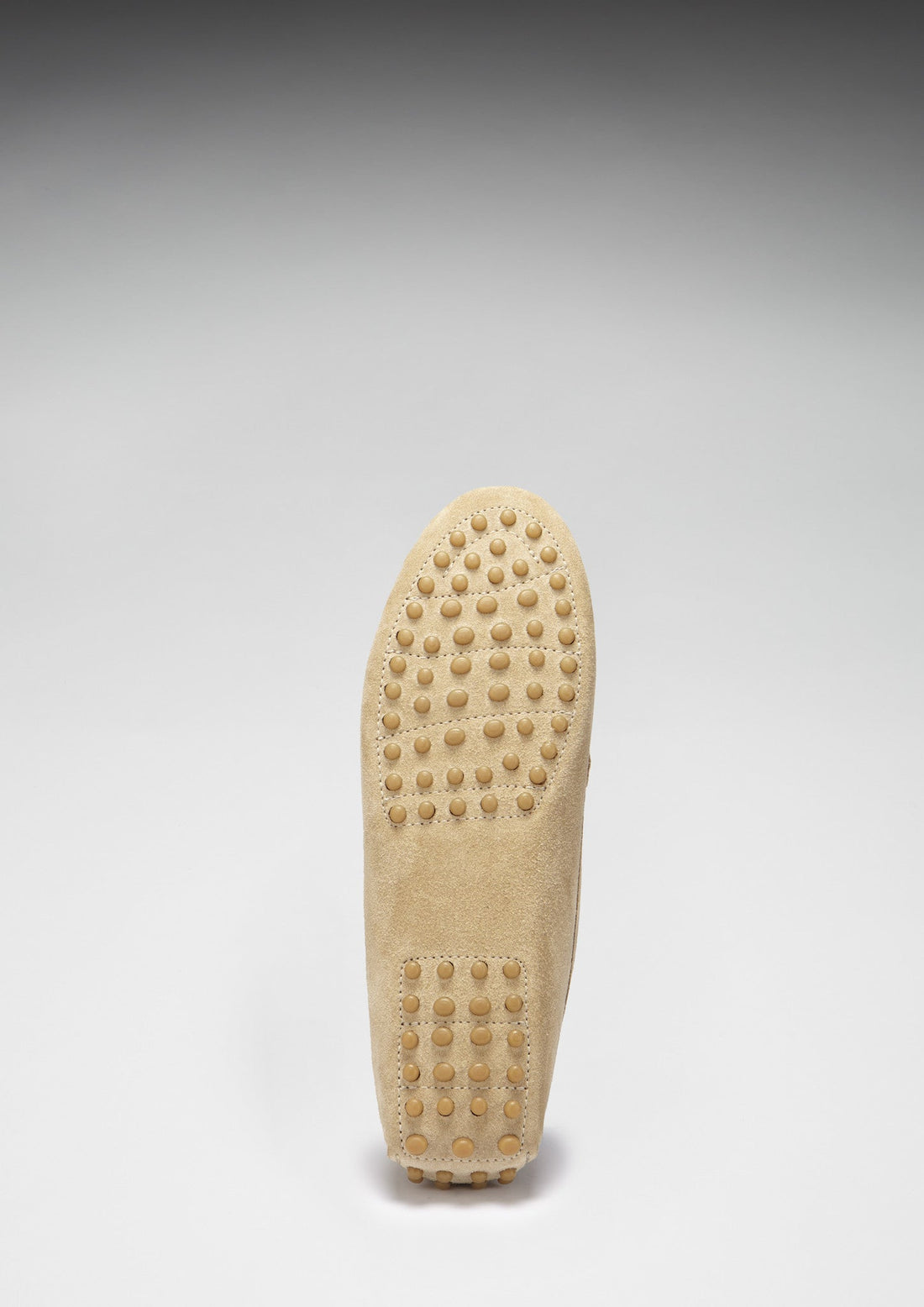 Driving loafer outsole with raised rubber grip studs