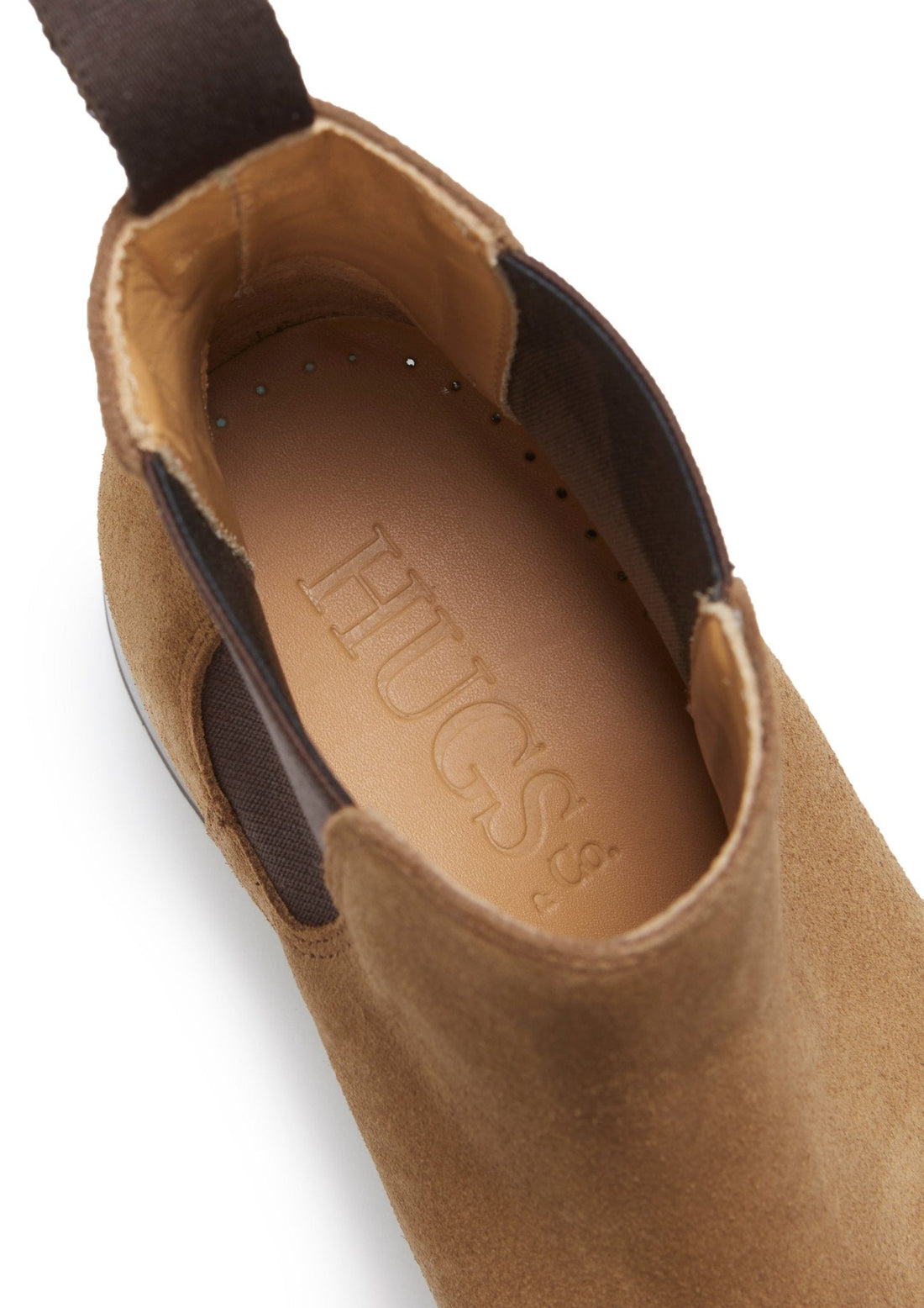Tan suede Chelsea boot interior with branded insole and perforations.