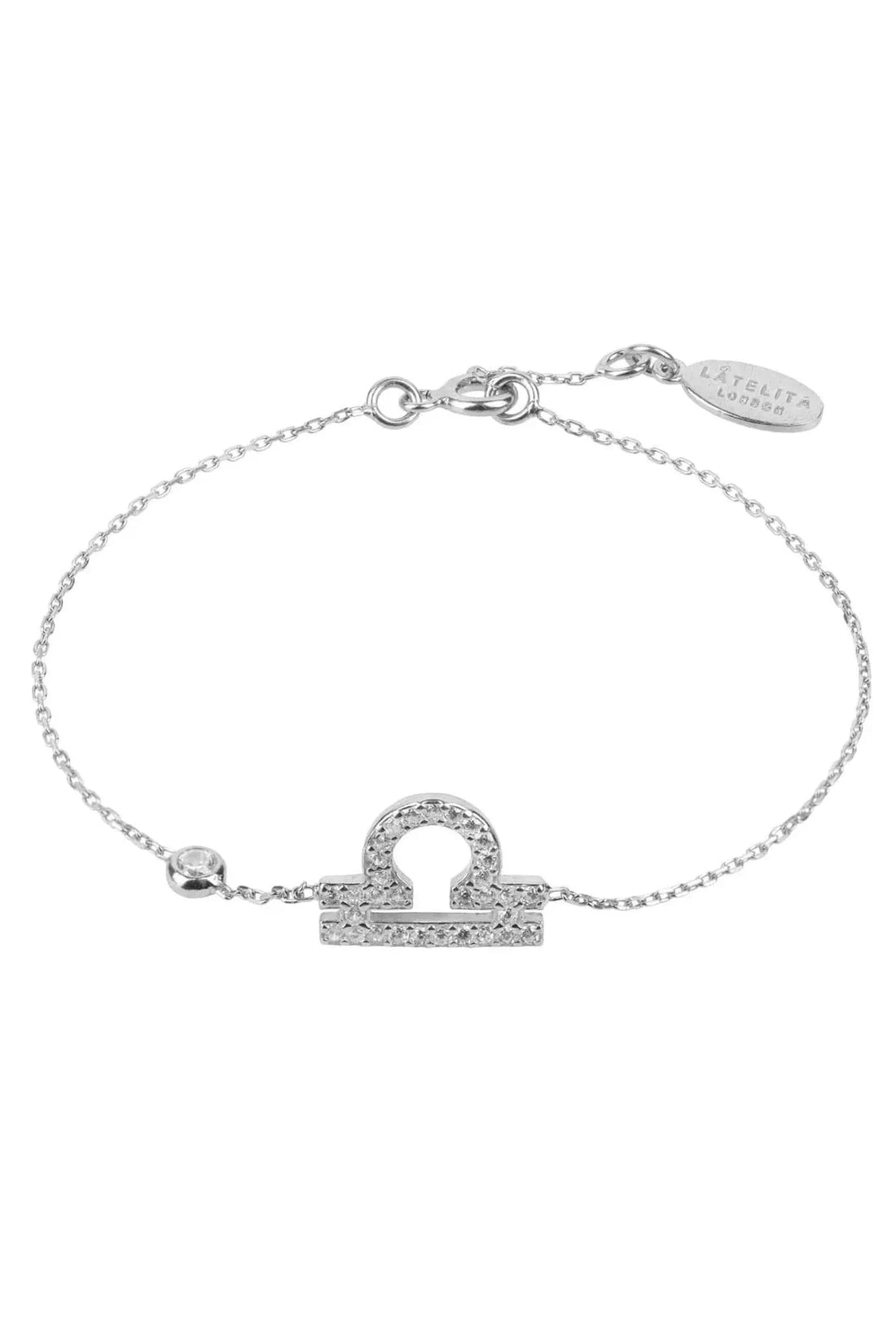 Silver tone bracelet with CZ zodiac pendant and oval engraved clasp tag