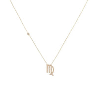 Rose gold Virgo zodiac pendant necklace with thin chain and glyph charm.